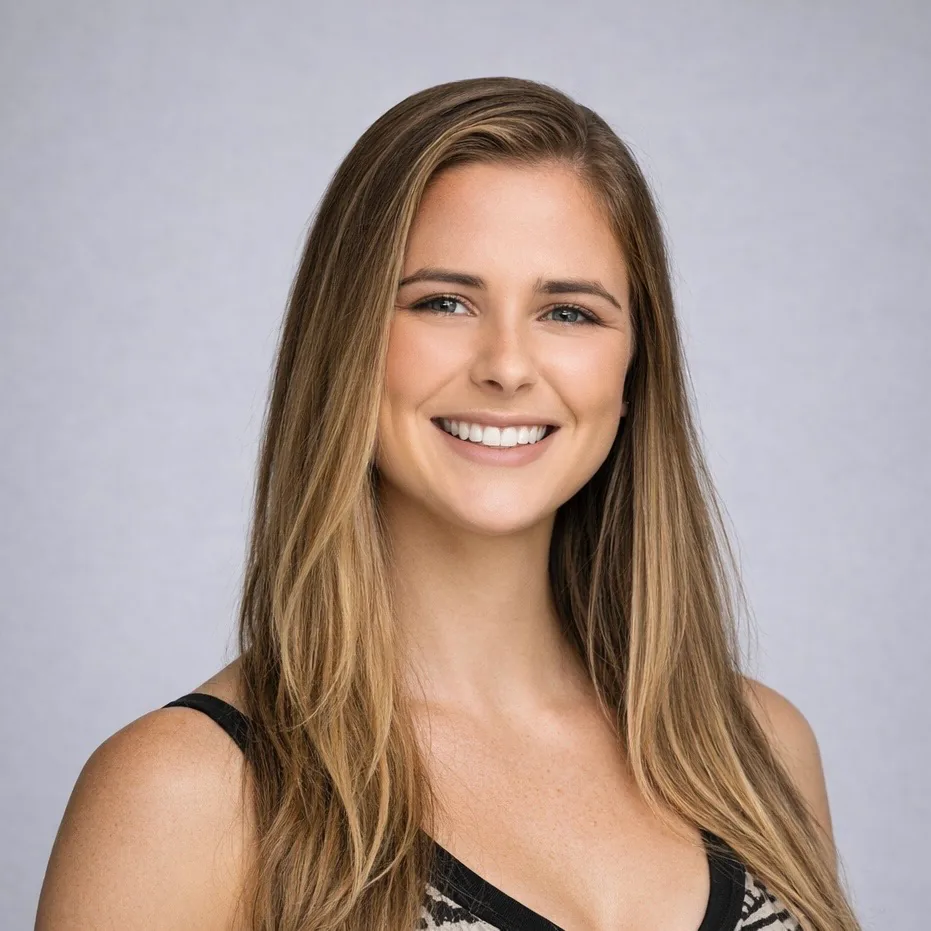 Professional headshot of Coach Casey